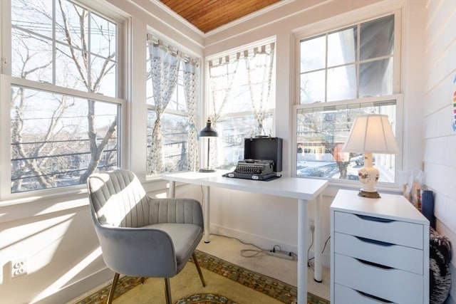 home office featuring a healthy amount of sunlight, wooden ceiling, and crown molding