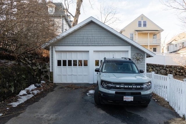 detached garage with fence