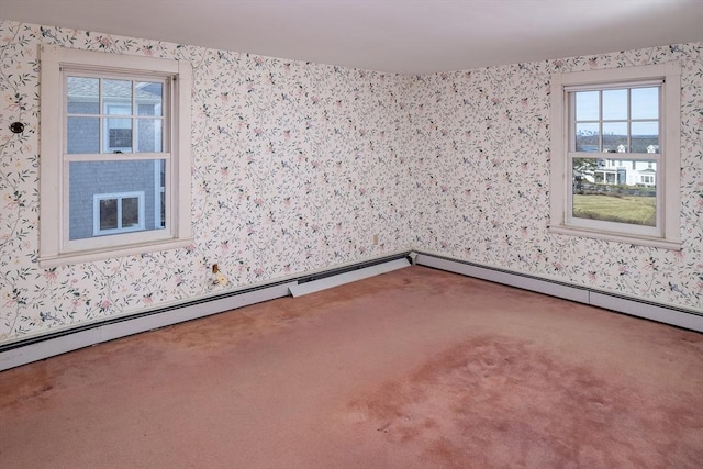 unfurnished room with wallpapered walls and carpet flooring