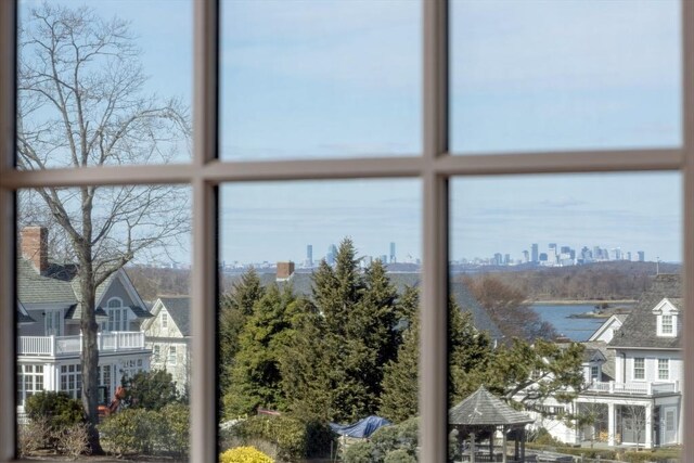 room details featuring a water view and a city view