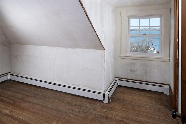 bonus room featuring baseboard heating, lofted ceiling, and hardwood / wood-style flooring