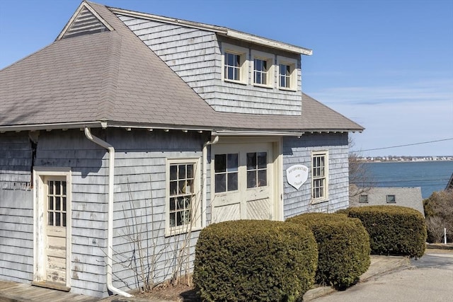 view of front of home featuring a water view