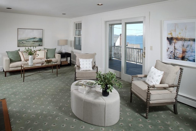 sitting room featuring carpet flooring