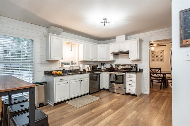 kitchen with sink, ceiling fan, stainless steel appliances, light hardwood / wood-style floors, and white cabinets