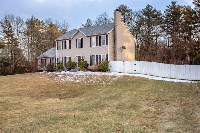 view of front of home with a front lawn