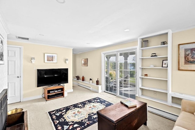 living area with a baseboard heating unit, a baseboard radiator, carpet flooring, baseboards, and crown molding