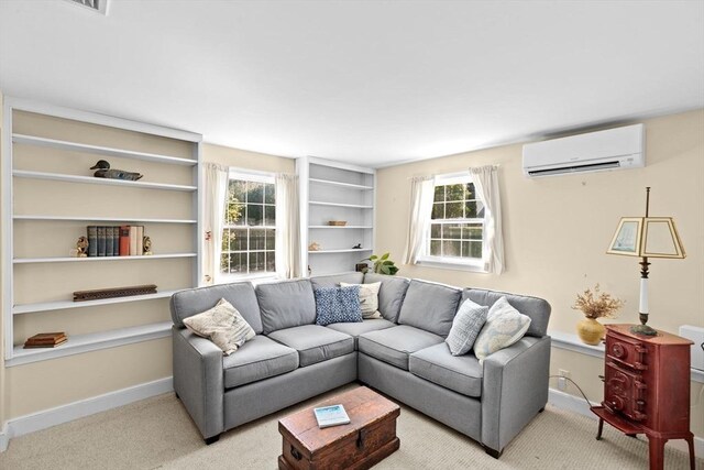 carpeted living area featuring a wall mounted air conditioner, healthy amount of natural light, and baseboards