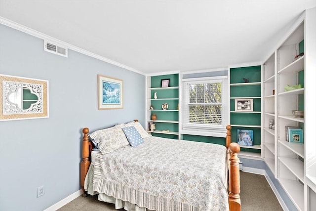 carpeted bedroom with baseboards and crown molding