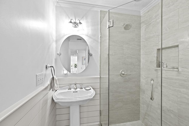 full bathroom featuring a shower stall and ornamental molding