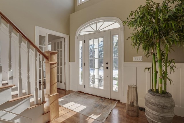 foyer entrance featuring wood-type flooring