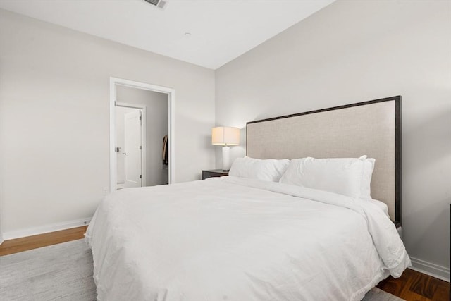 bedroom with light hardwood / wood-style flooring