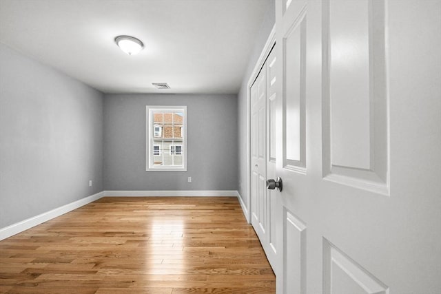 218 Tuttle St, Fall River, MA 02724 - empty room featuring light wood-style floors and baseboards