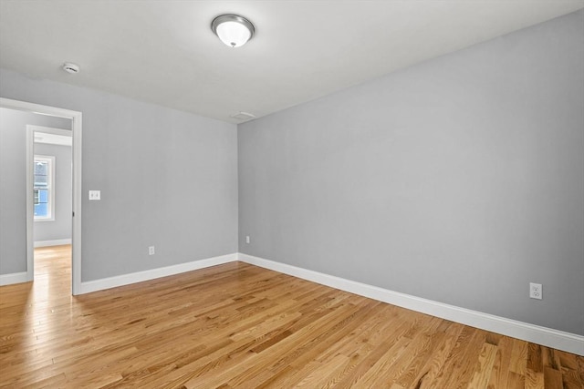 218 Tuttle St, Fall River, MA 02724 - unfurnished room featuring light wood-type flooring and a smoke detector