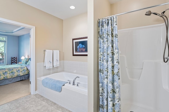 bathroom featuring tile patterned flooring and plus walk in shower