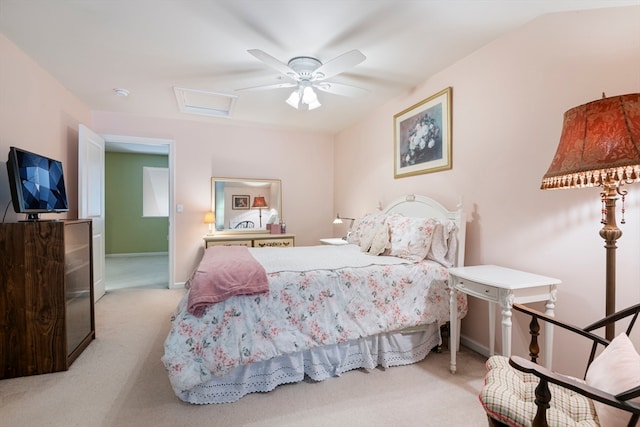 bedroom with light carpet and ceiling fan