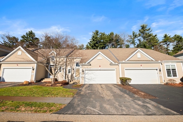 ranch-style home featuring a garage