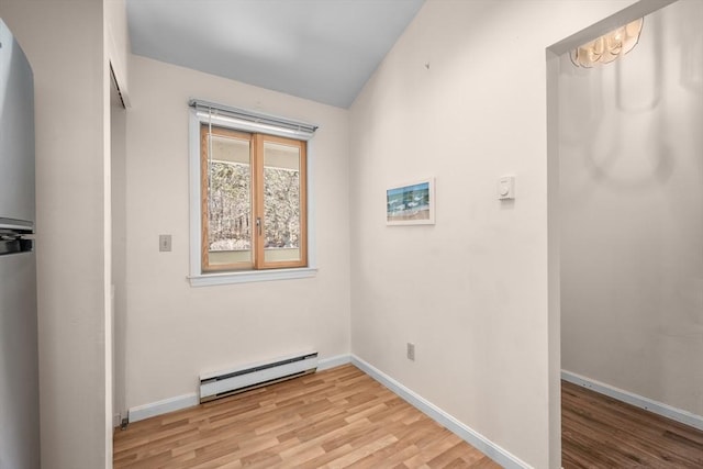 53 Chilton Ln Unit 53, Brewster, MA 02631 - interior space featuring baseboard heating, baseboards, and light wood-style flooring