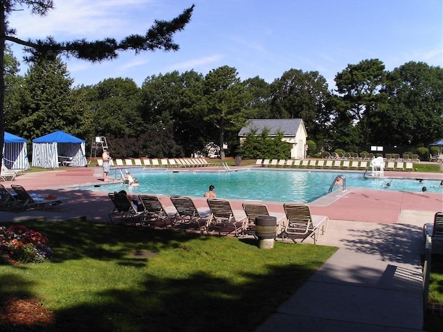 53 Chilton Ln Unit 53, Brewster, MA 02631 - pool with fence, a yard, and a patio