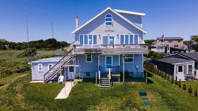 36 First St, Westport, MA 02790 - back of house featuring stairs, a lawn, a deck, and a chimney