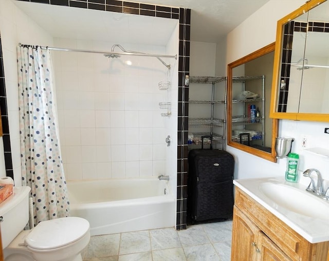 full bathroom with vanity, shower / bath combo, and toilet