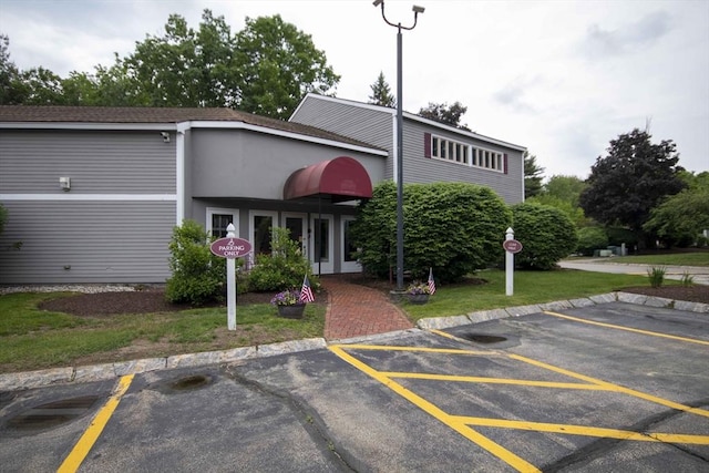 120 Fisherville Rd Unit 121, Concord, NH 03303 - view of building exterior with uncovered parking