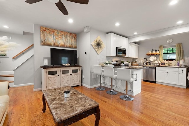 99 Lincoln St, Stoughton, MA 02072 - living room featuring a ceiling fan, light wood-type flooring, baseboards, and recessed lighting