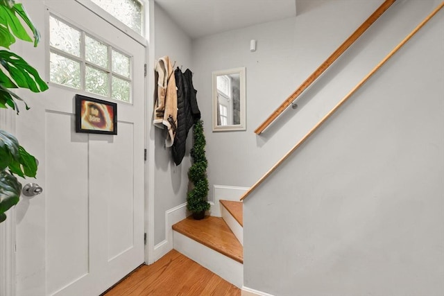 99 Lincoln St, Stoughton, MA 02072 - entrance foyer featuring stairs, light wood-style floors, and baseboards