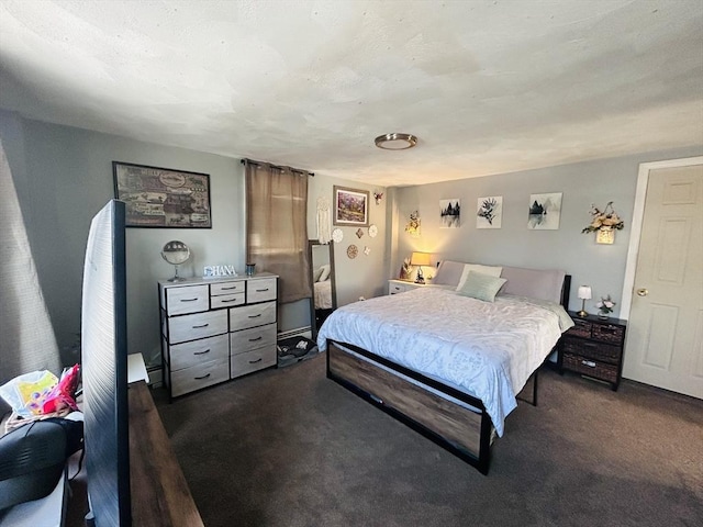 bedroom featuring dark colored carpet