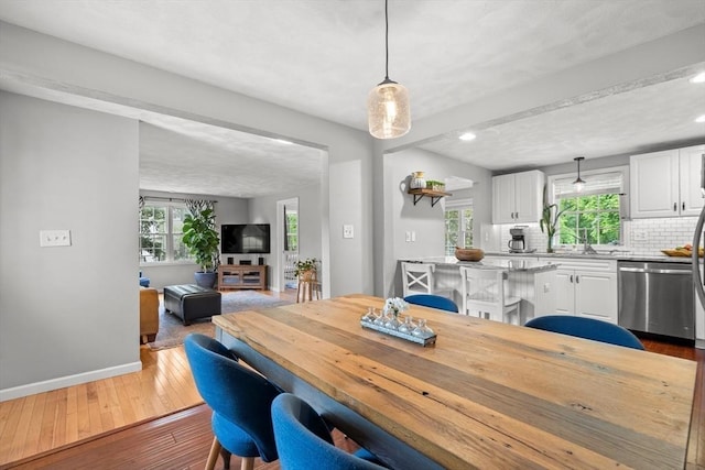 21 Forest St, Wilmington, MA 01887 - dining area featuring dark wood-type flooring, plenty of natural light, baseboards, and recessed lighting
