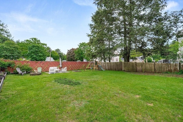 21 Forest St, Wilmington, MA 01887 - view of yard with a playground and a fire pit