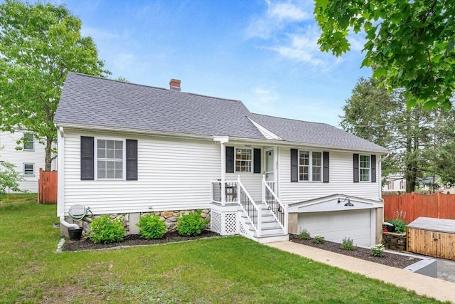 21 Forest St, Wilmington, MA 01887 - view of front facade featuring a chimney, a shingled roof, and a garage