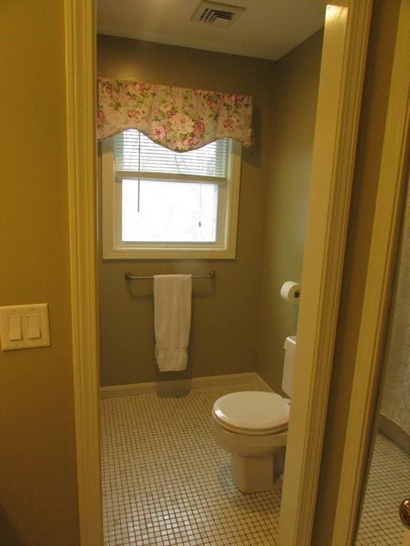101 S Ave Unit 202, Attleboro, MA 02703 - bathroom featuring toilet and tile patterned floors