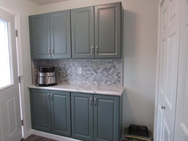 101 S Ave Unit 202, Attleboro, MA 02703 - kitchen featuring backsplash, gray cabinetry, and light countertops