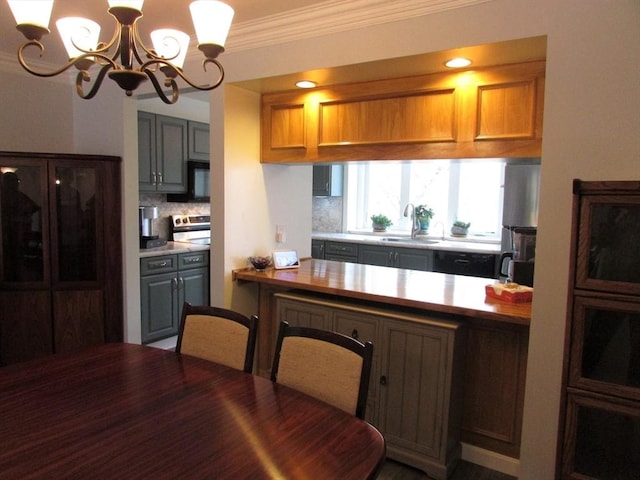101 S Ave Unit 202, Attleboro, MA 02703 - dining room featuring a chandelier and crown molding