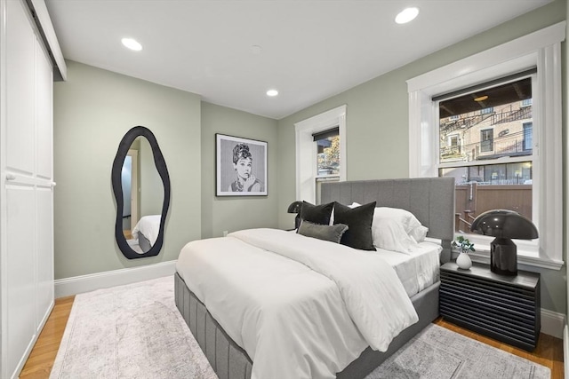 bedroom featuring wood-type flooring