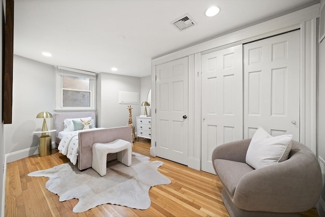 bedroom featuring light hardwood / wood-style floors