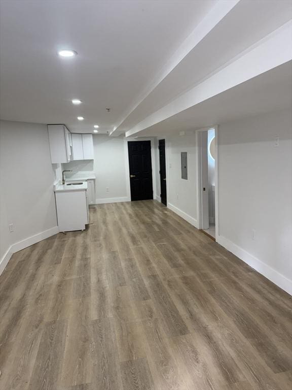 567 Park St Unit 1And B, Boston, MA 02124 - finished basement featuring baseboards, light wood-style flooring, recessed lighting, and a sink
