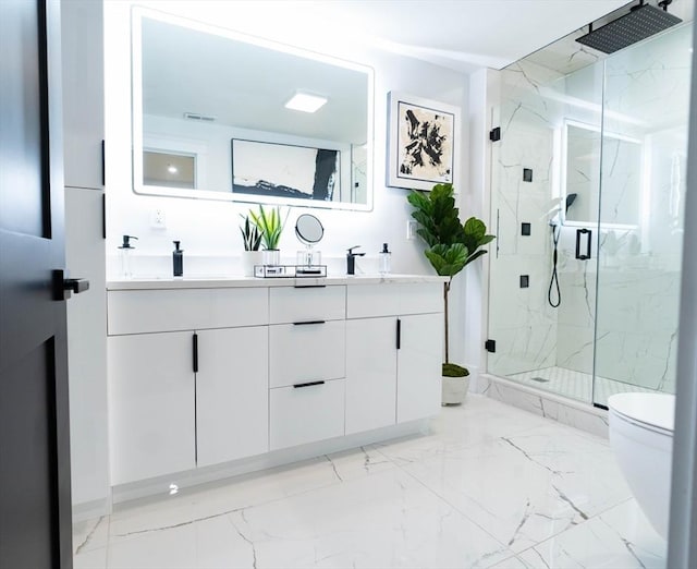 567 Park St Unit 1And B, Boston, MA 02124 - bathroom with a marble finish shower, toilet, double vanity, and marble finish flooring