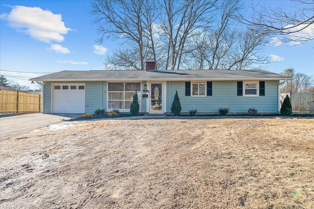 single story home with a garage