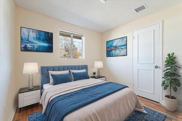 bedroom featuring light wood-type flooring