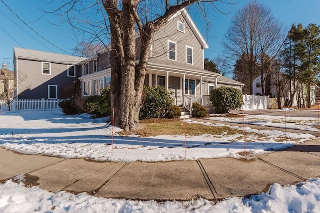 view of front property featuring a porch