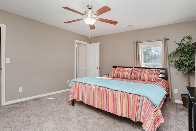 carpeted bedroom featuring ceiling fan