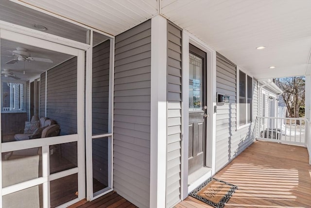 exterior space featuring ceiling fan and a porch