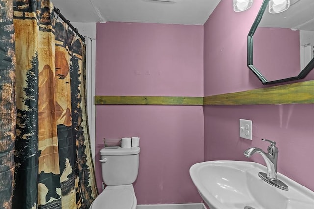 125 Blackstone St, Uxbridge, MA 01569 - full bathroom with a sink, toilet, and a shower with shower curtain