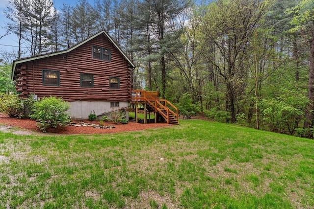 125 Blackstone St, Uxbridge, MA 01569 - view of green lawn featuring stairway and a wooden deck