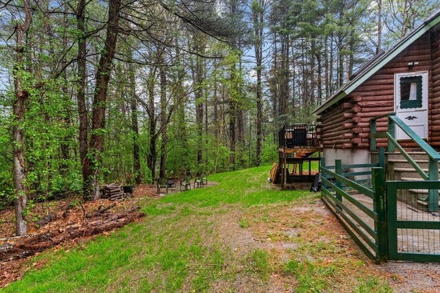 125 Blackstone St, Uxbridge, MA 01569 - view of yard featuring a deck