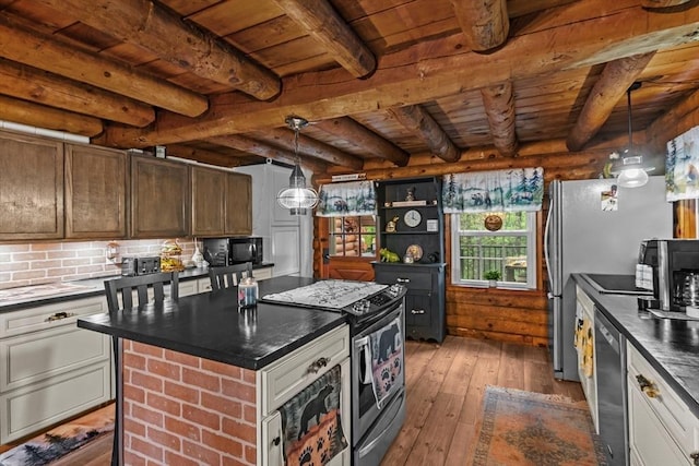 125 Blackstone St, Uxbridge, MA 01569 - kitchen with stainless steel appliances, wooden ceiling, dark countertops, light wood-style floors, and beamed ceiling