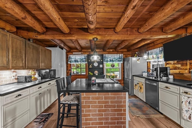 125 Blackstone St, Uxbridge, MA 01569 - kitchen featuring wood ceiling, appliances with stainless steel finishes, dark countertops, dark wood-style flooring, and beamed ceiling