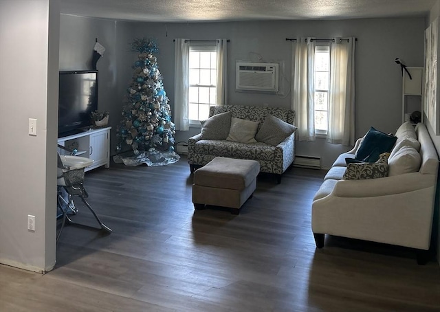 living room with a textured ceiling, a baseboard radiator, an AC wall unit, and dark hardwood / wood-style floors