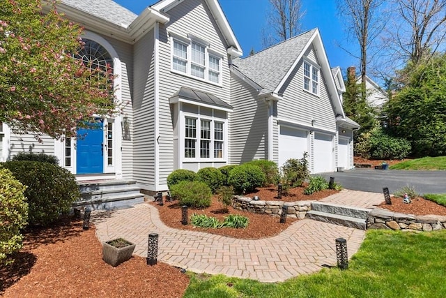 3 Anders Way, Acton, MA 01720 - view of side of home featuring an attached garage, asphalt driveway, and a shingled roof